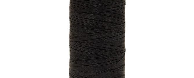 Black spool of marine thread with a wide orange base, displaying a textured surface and tightly wound strands.